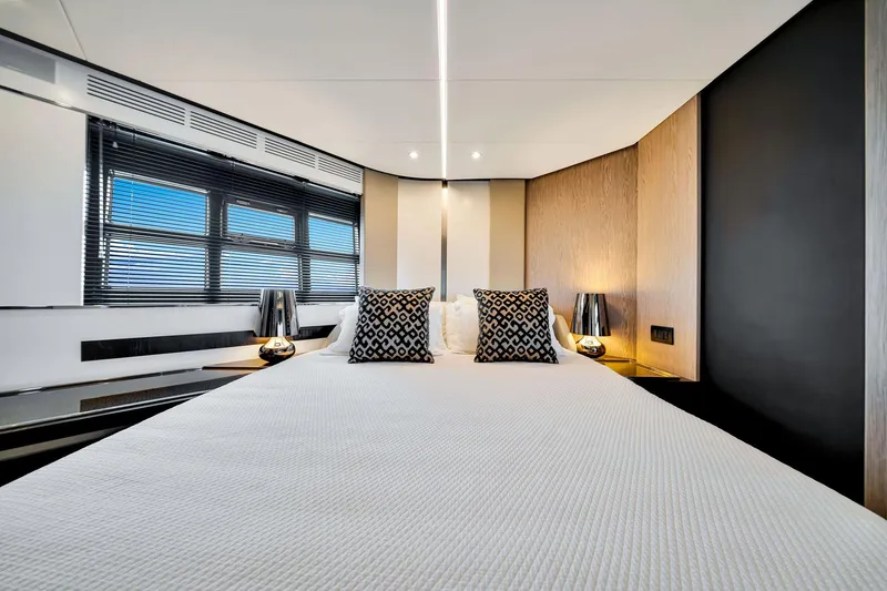 Slide: The Image of Luxurious bedroom interior of 2021 Azimut S6 yacht with modern decor and stylish lighting. - 22