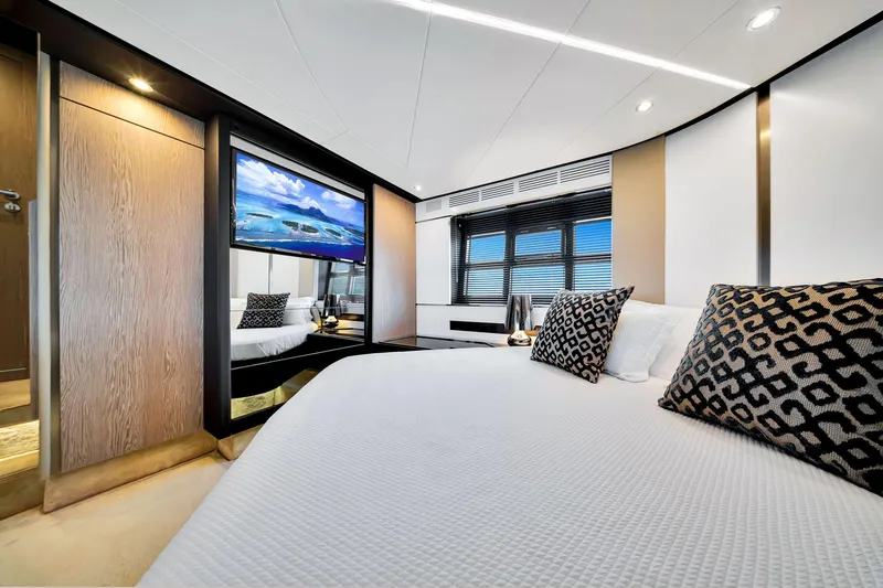 Slide: The Image of Luxurious bedroom interior of 2021 Azimut S6 yacht with modern decor and large window. - 23