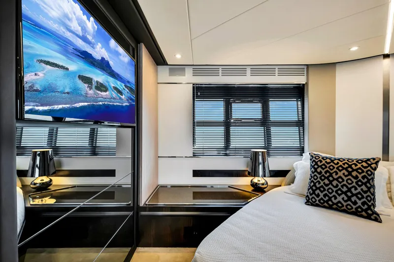 Slide: The Image of Luxurious interior of 2021 Azimut S6 yacht with modern decor and scenic view on TV. - 25