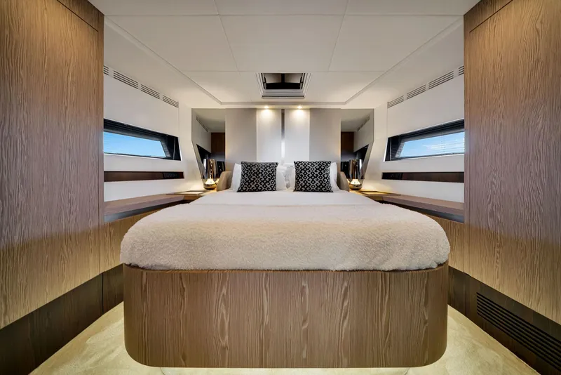 Slide: The Image of Luxurious bedroom interior of 2021 Azimut S6 yacht with modern design and cozy bedding. - 30