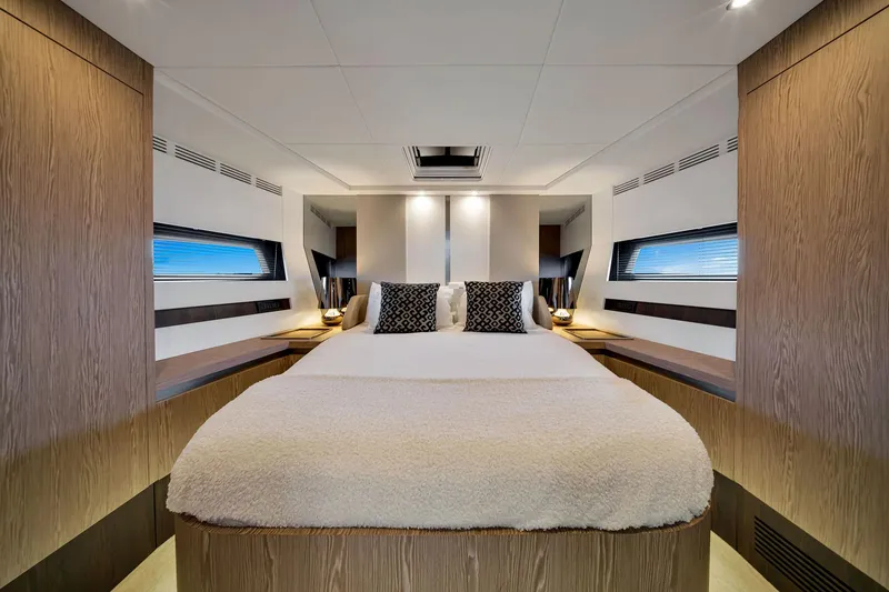 Slide: The Image of Luxurious bedroom interior of 2021 Azimut S6 yacht with modern design and cozy bedding. - 31