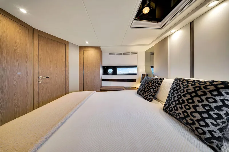 Slide: The Image of Luxurious bedroom interior of 2021 Azimut S6 yacht with modern design and elegant decor. - 33