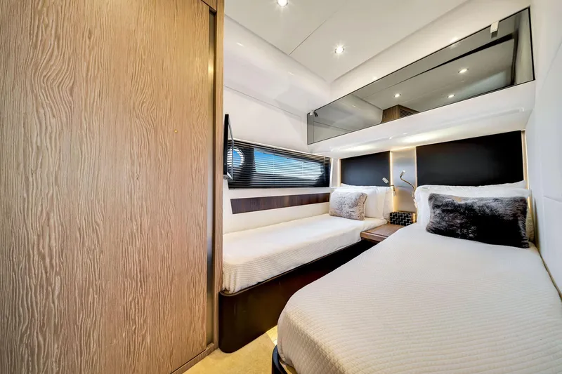 Slide: The Image of Luxurious cabin interior of 2021 Azimut S6 yacht with twin beds and modern decor. - 39