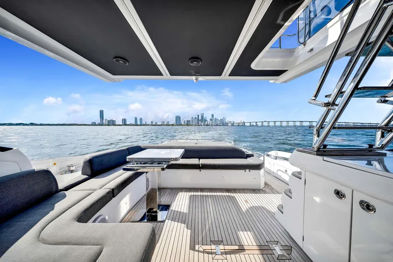 Slide: The Image of Luxurious 2021 Azimut S6 yacht interior with city skyline and ocean view. - 4