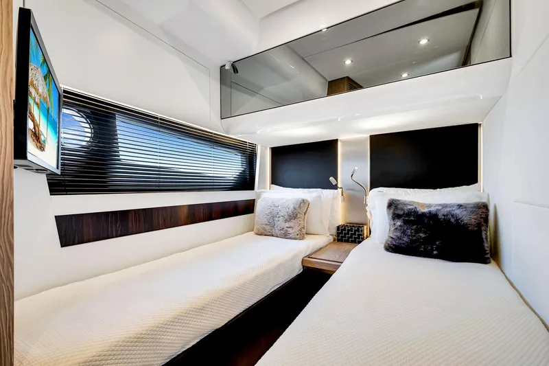 Slide: The Image of Luxurious 2021 Azimut S6 yacht cabin with twin beds and modern decor. - 40