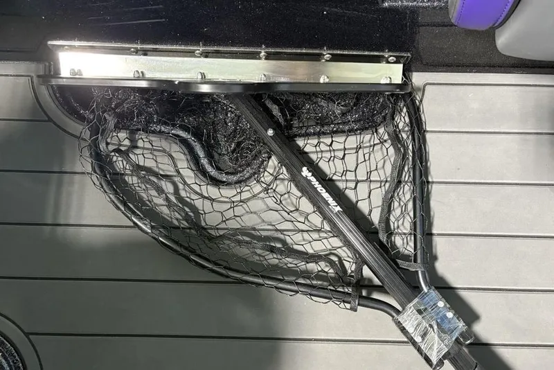 Slide: The Image of Fishing net stored on Phoenix 920 Elite X boat deck, 2026 model. - 24