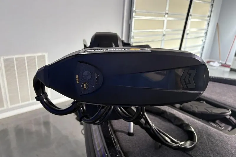 Slide: The Image of Close-up of Phoenix 920 Elite X 2026 boat motor in a garage setting. - 8