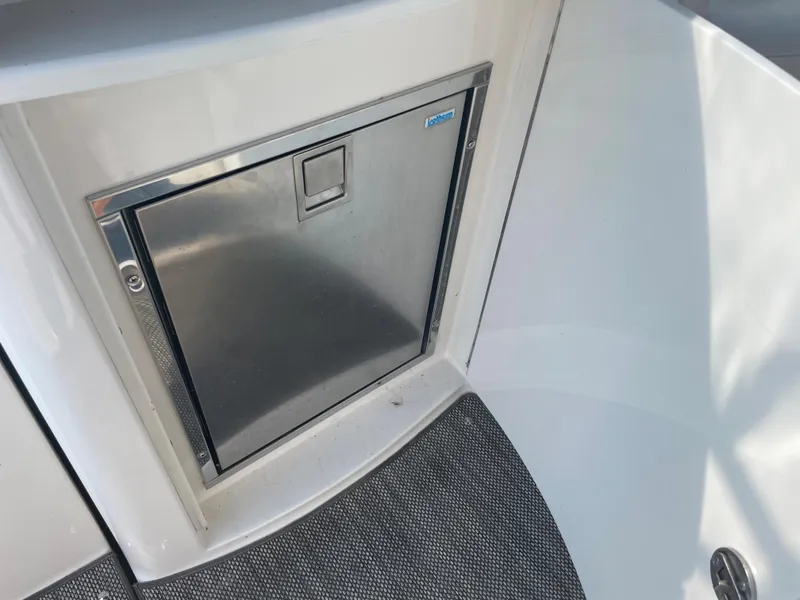 Slide: The Image of Stainless steel refrigerator on 2007 Chaparral 330 Signature boat. - 16