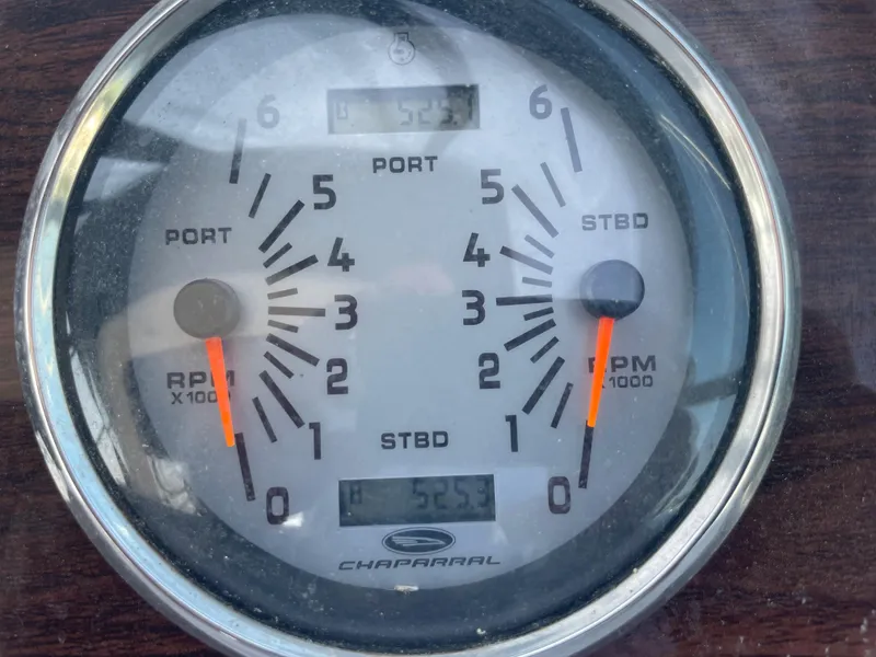 Slide: The Image of 2007 Chaparral 330 Signature boat tachometer gauge showing RPM and engine hours. - 20