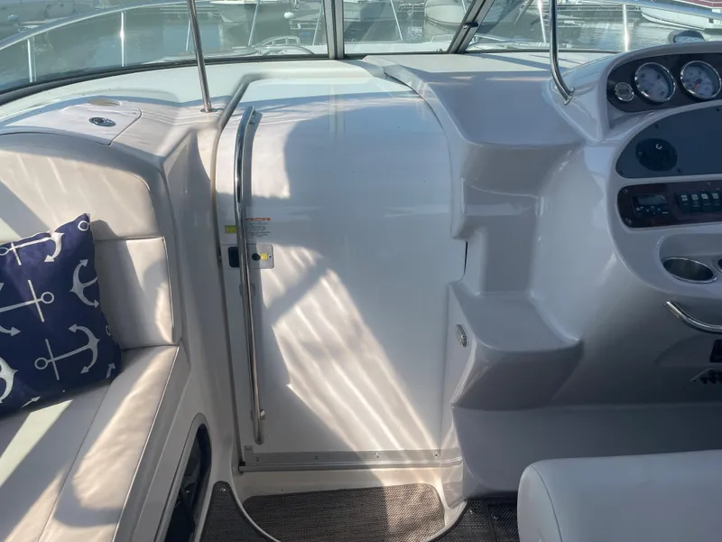 Slide: The Image of 2007 Chaparral 330 Signature boat interior with helm and seating area. - 27