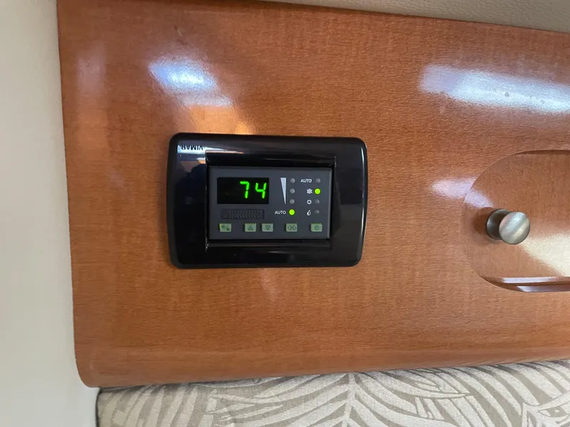 Slide: The Image of Digital thermostat on 2007 Chaparral 330 Signature boat, displaying 74 degrees. - 37