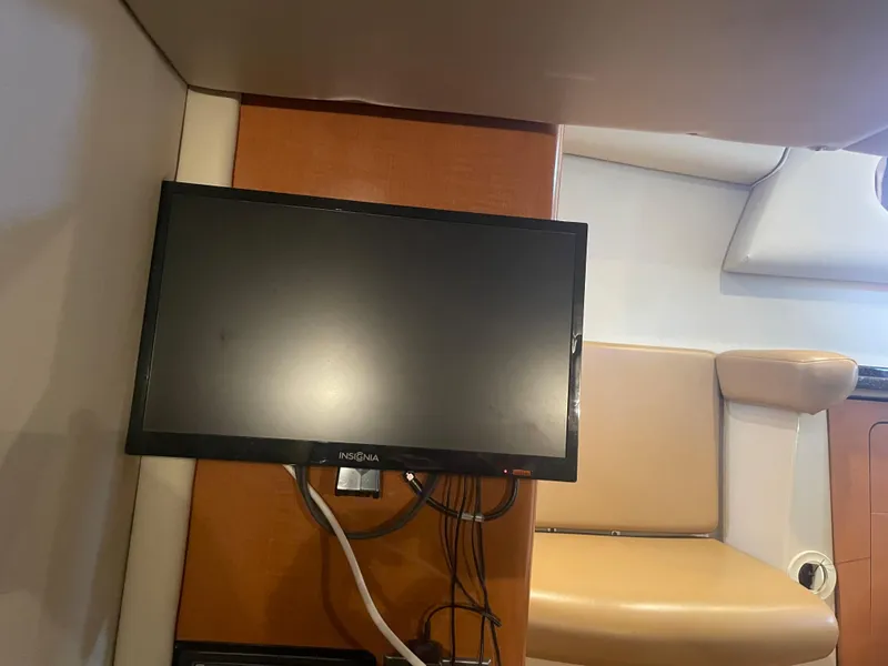 Slide: The Image of Flat-screen TV in the cabin of a 2007 Chaparral 330 Signature boat. - 43