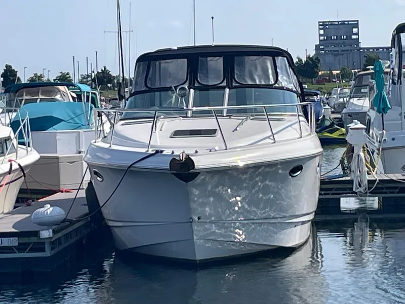 Slide: The Image of 2007 Chaparral 330 Signature boat docked at a marina. - 6