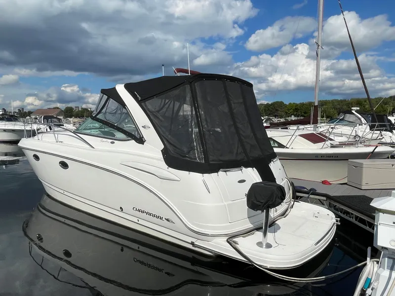 Slide: The Image of 2007 Chaparral 330 Signature boat docked at a marina. - 9
