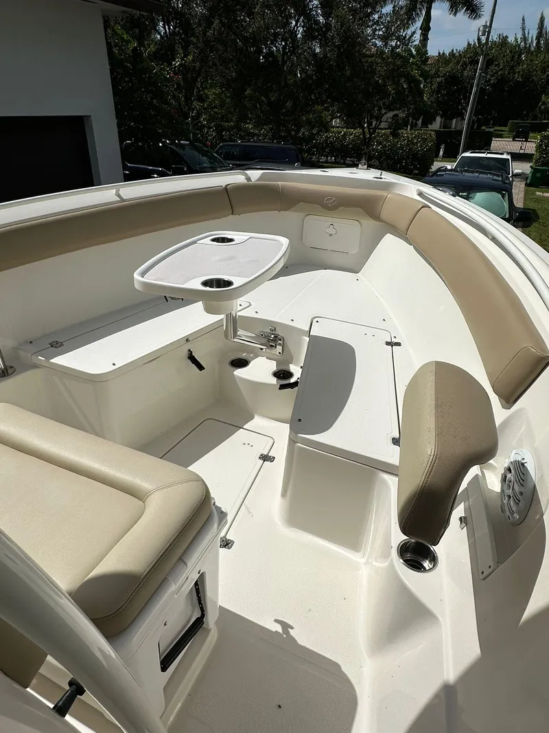 Slide: The Image of Interior of a 2018 Sailfish 270 CC boat cabin with storage and equipment. - 21