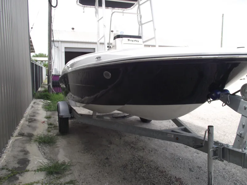 Slide: The Image of 2025 Bayliner Trophy T18 boat on trailer. - 2