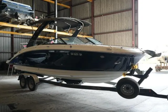 Slide: The Image of 2022 Sea Ray SDX 270 boat on trailer in storage facility. - 3