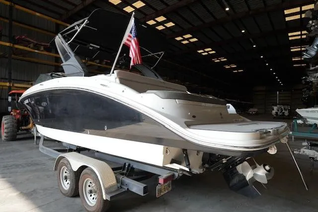 Slide: The Image of 2022 Sea Ray SDX 270 boat on trailer in warehouse, rear view. - 5