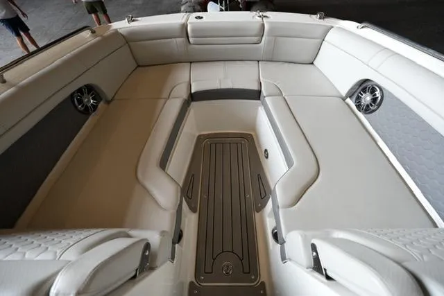 Slide: The Image of 2022 Sea Ray SDX 270 boat interior with spacious seating and modern design. - 6