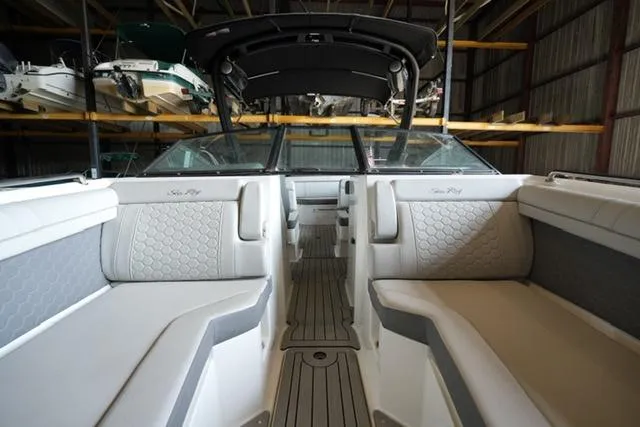 Slide: The Image of 2022 Sea Ray SDX 270 boat interior with elegant seating and modern design. - 7