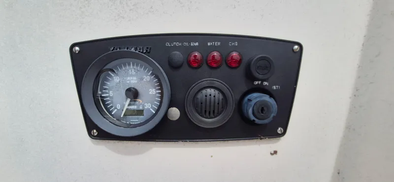 Slide: The Image of Control panel of a 1979 Bristol 35.5 boat with gauges and indicator lights. - 10