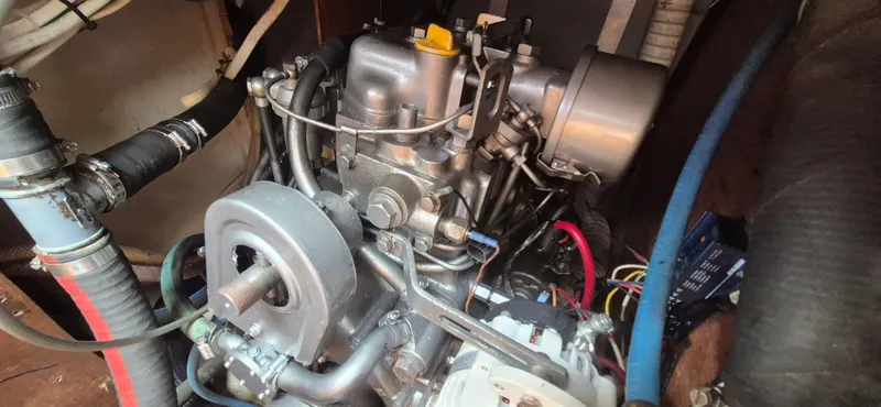 Slide: The Image of 1979 Bristol 35.5 engine compartment with visible mechanical components and wiring. - 15