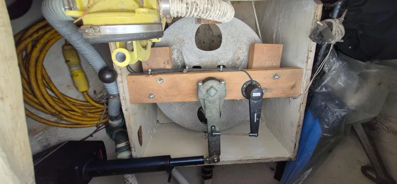 Slide: The Image of 1979 Bristol 35.5 boat interior showing mechanical components and wiring. - 17