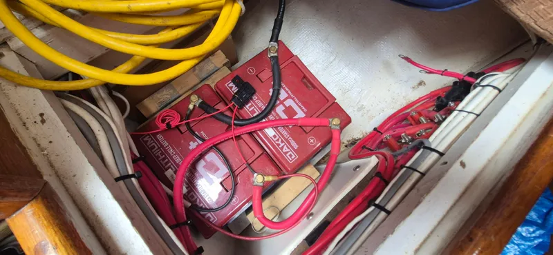 Slide: The Image of Battery compartment with wiring in a 1979 Bristol 35.5 boat. - 18