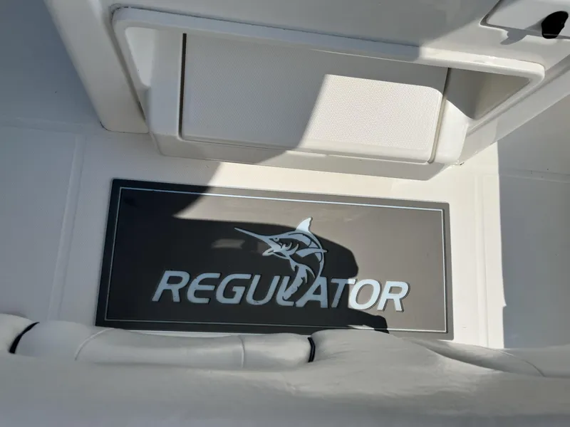 Slide: The Image of Regulator 23 boat interior, logo with marlin design, 2016 model. - 25