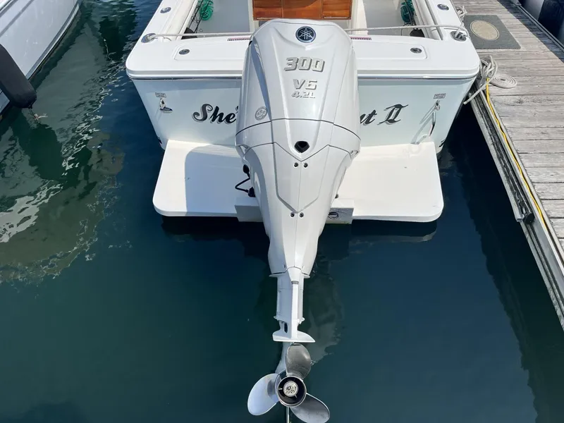 Slide: The Image of 2016 Regulator 23 boat with Yamaha 300 V6 outboard motor at dock. - 7