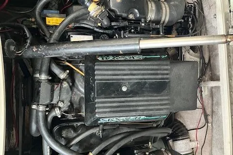 Slide: The Image of Engine of 1988 Sea Ray Pachanga 22 boat, showcasing mechanical components and wiring. - 8