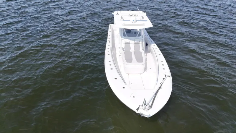 Slide: The Image of 2022 Invincible 36 Open Fisherman boat on open water, aerial view. - 10