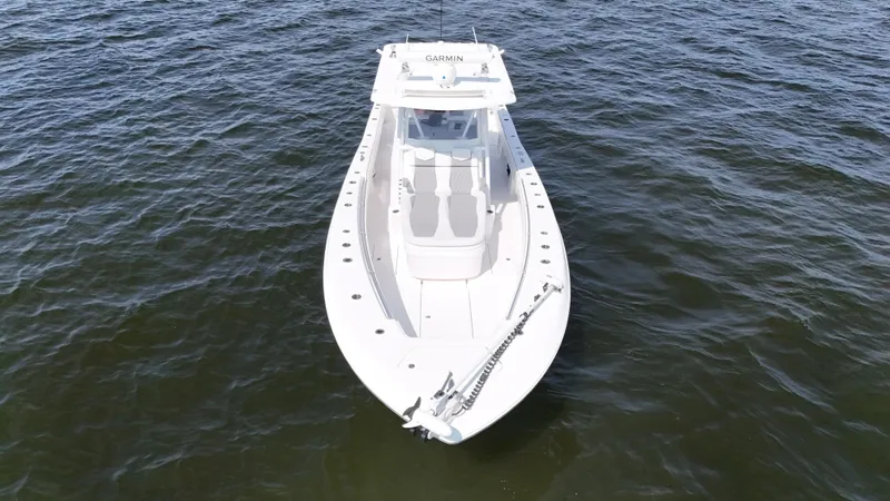 Slide: The Image of 2022 Invincible 36 Open Fisherman boat on open water, aerial view. - 11