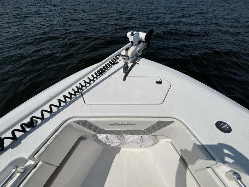 Slide: The Image of 2022 Invincible 36 Open Fisherman boat deck on calm water. - 18