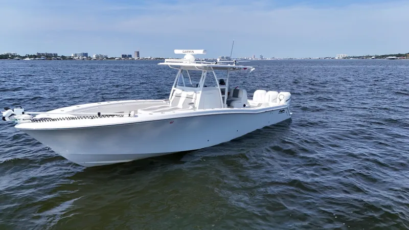 Slide: The Image of 2022 Invincible 36 Open Fisherman boat on calm waters. - 5