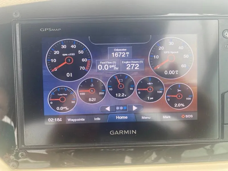 Slide: The Image of Garmin GPS display on 2019 Regal 26 Express showing engine metrics and odometer reading. - 10