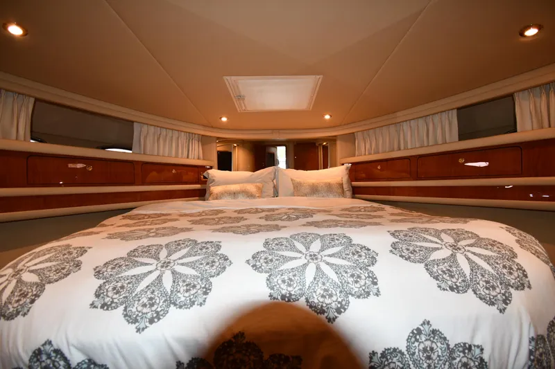 Slide: The Image of Luxurious bedroom interior of 2001 Sea Ray 480 Sedan Bridge yacht. - 41