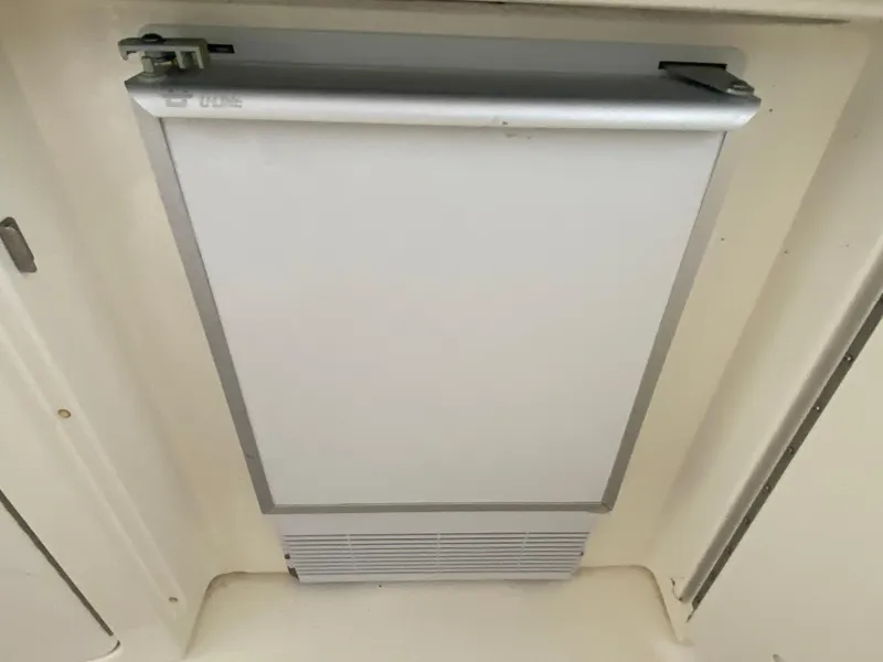 Slide: The Image of Built-in refrigerator on a 1999 Sea Ray 380 Sundancer yacht. - 11