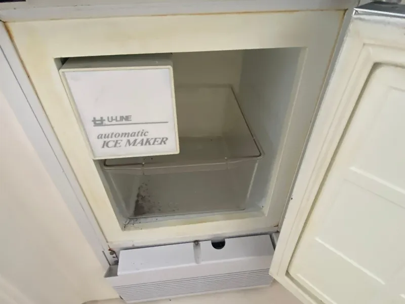 Slide: The Image of U-Line automatic ice maker in a 1999 Sea Ray 380 Sundancer yacht. - 12
