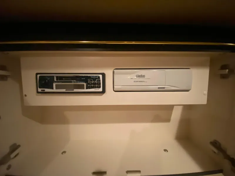 Slide: The Image of 1999 Sea Ray 380 Sundancer stereo system with Clarion components in cabin. - 24