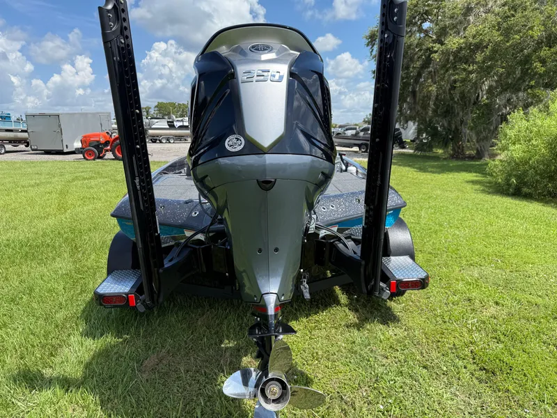 Slide: The Image of 2026 Blazer 650 NAP boat engine on grass, showcasing powerful design and sleek finish. - 16