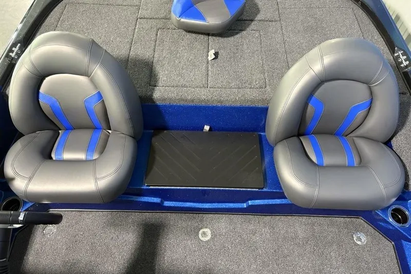 Slide: The Image of 2026 Nitro Z17 boat interior with gray and blue cushioned seats. - 12