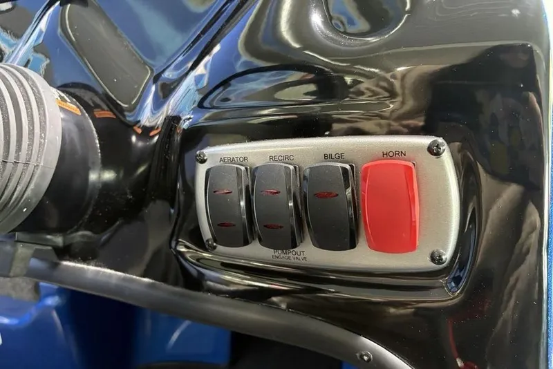 Slide: The Image of Control panel of a 2026 Nitro Z17 boat with switches for aerator, recirc, bilge, and horn. - 15