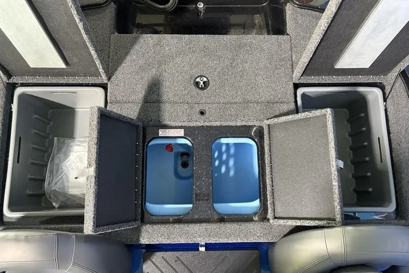 Slide: The Image of Interior storage compartments of a 2026 Nitro Z17 boat. - 19