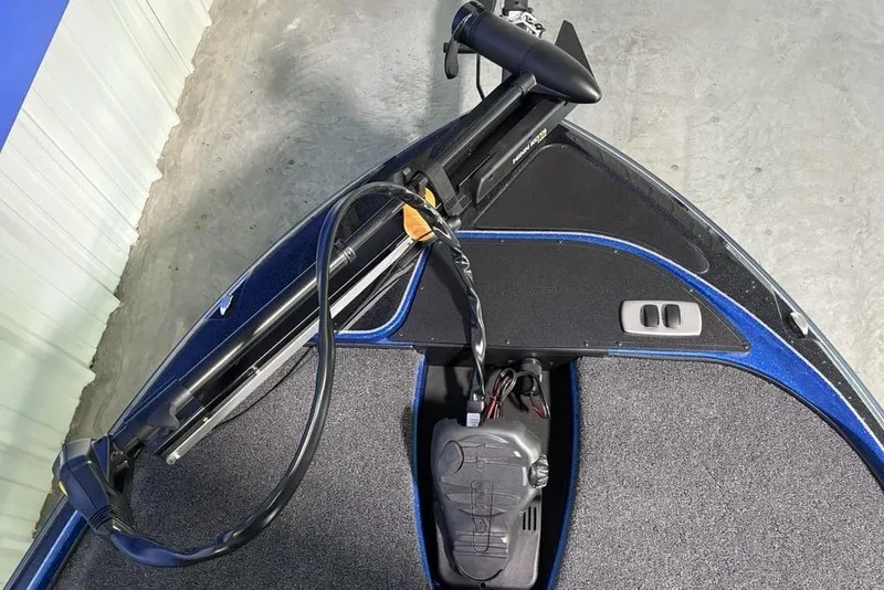 Slide: The Image of 2026 Nitro Z17 boat deck with trolling motor and control panel. - 2