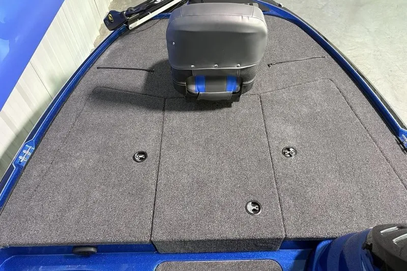 Slide: The Image of 2026 Nitro Z17 boat deck with gray carpet and seating. - 24