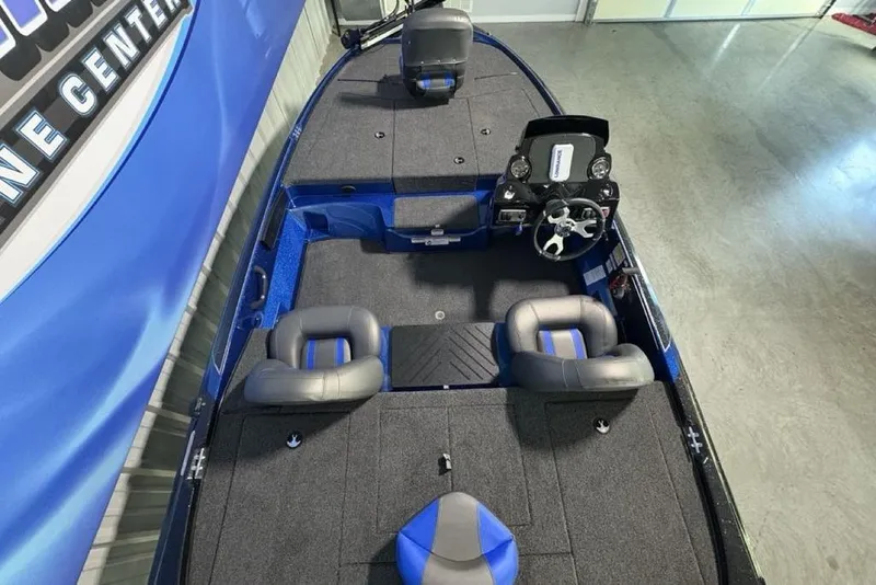 Slide: The Image of 2026 Nitro Z17 boat interior with gray seating and modern dashboard. - 29