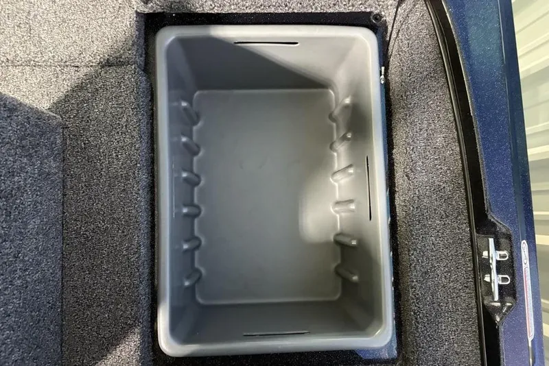 Slide: The Image of Storage compartment in 2026 Nitro Z17 boat, featuring a spacious, carpeted interior. - 30