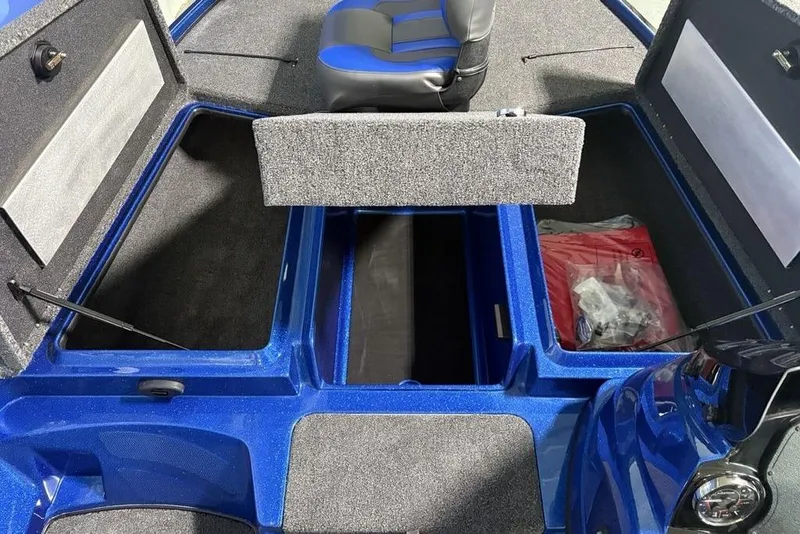 Slide: The Image of 2026 Nitro Z17 boat storage compartments with blue interior and seating. - 5