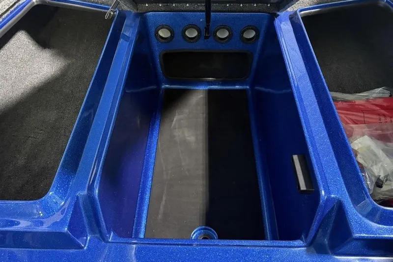 Slide: The Image of 2026 Nitro Z17 boat storage compartment with blue finish and multiple storage areas. - 6